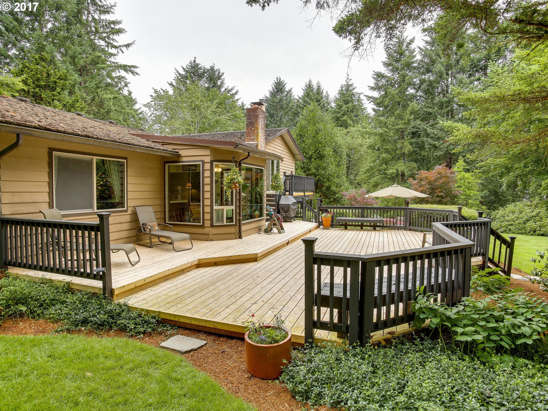 22374 Southeast Ridgeview Drive Damascus, OR 97089 - Photo 6 of 32 a view of a house with backyard and sitting area