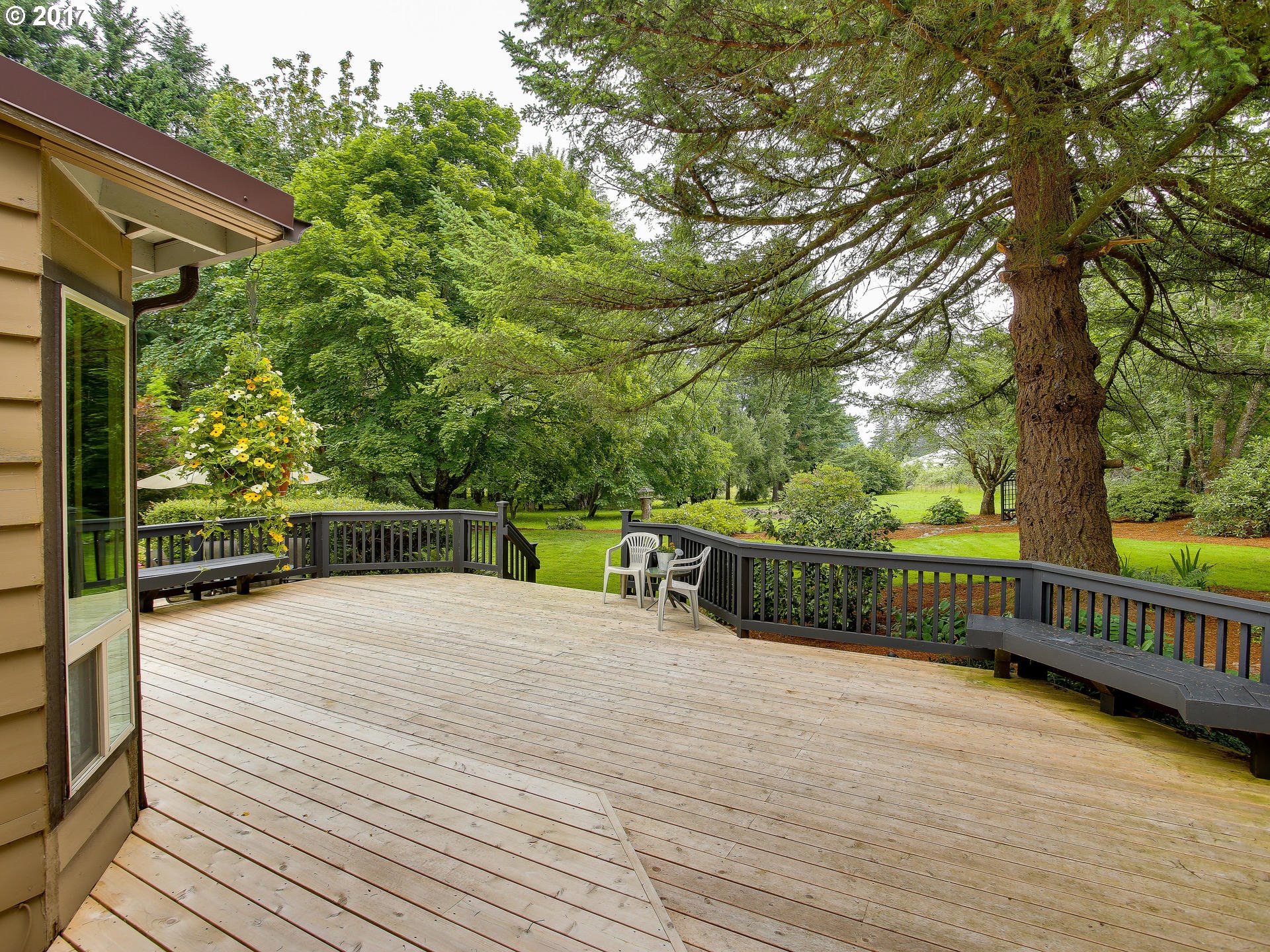 22374 Southeast Ridgeview Drive Damascus, OR 97089 - Photo 7 of 32 a view of balcony with wooden floor and fence