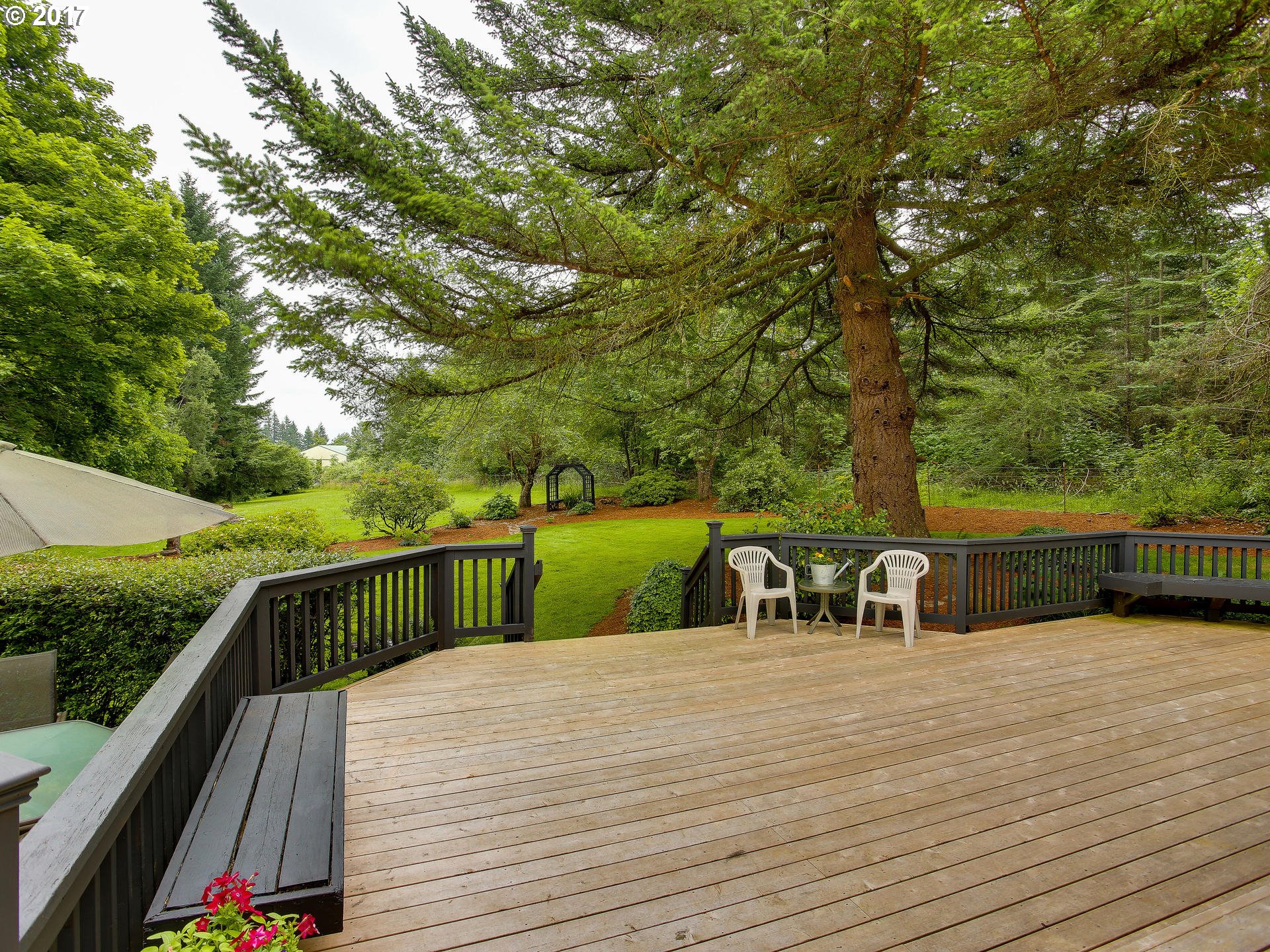 22374 Southeast Ridgeview Drive Damascus, OR 97089 - Photo 8 of 32 a view of a swimming pool with a patio