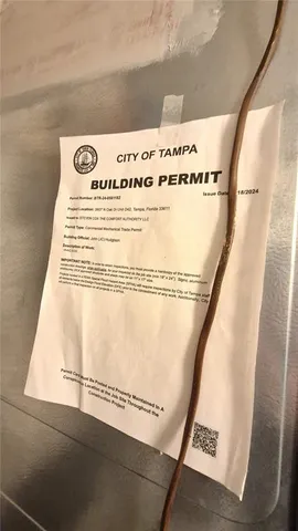 a utility room with sink dryer and washer