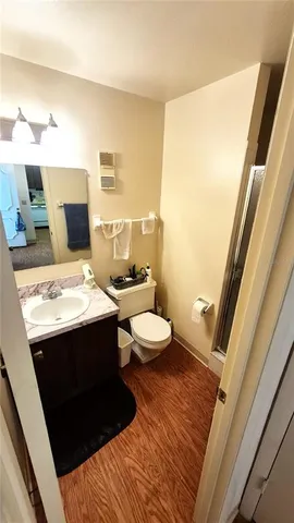 a view of table and chairs in a kitchen