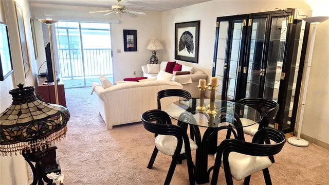 a bedroom with a bed and a chair