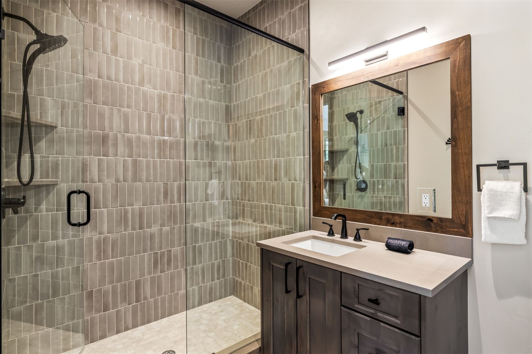 99 Independence Lane Keystone, CO 80435 - Photo 24 of 50 a bathroom with a sink shower and a mirror