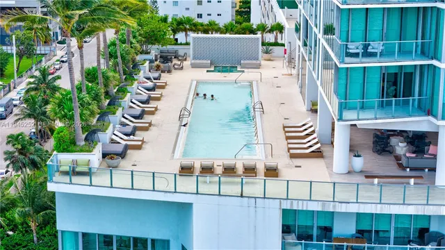 a view of a living room and dining room