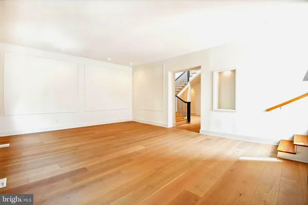 a view of empty room with a fireplace