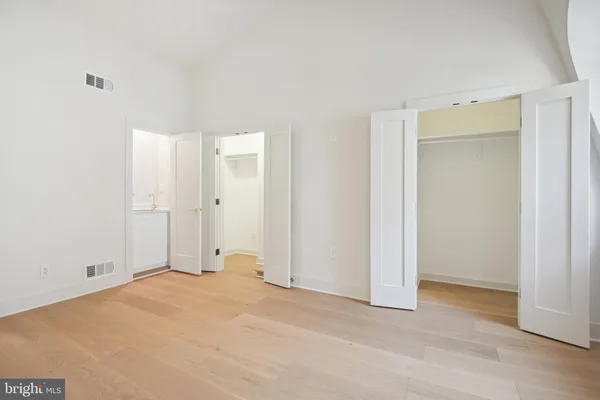 a bathroom with a shower and toilet