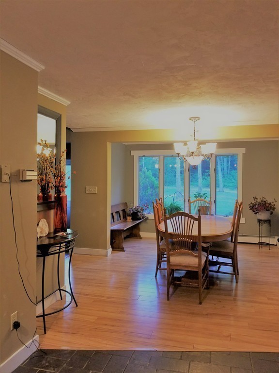 47 Laurel Lake Road Royalston, MA 01368 - Photo 3 of 10 a living room with furniture a rug and a large window