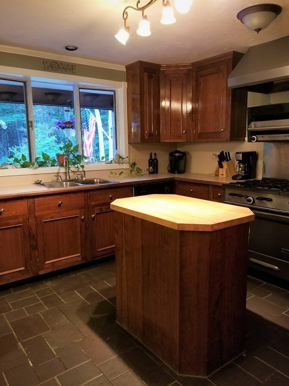 47 Laurel Lake Road Royalston, MA 01368 - Photo 4 of 10 a kitchen with a sink appliances and cabinets