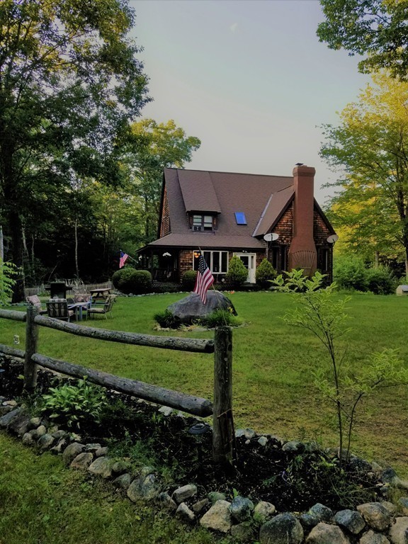 47 Laurel Lake Road Royalston, MA 01368 - Photo 9 of 10 a front view of a house with garden