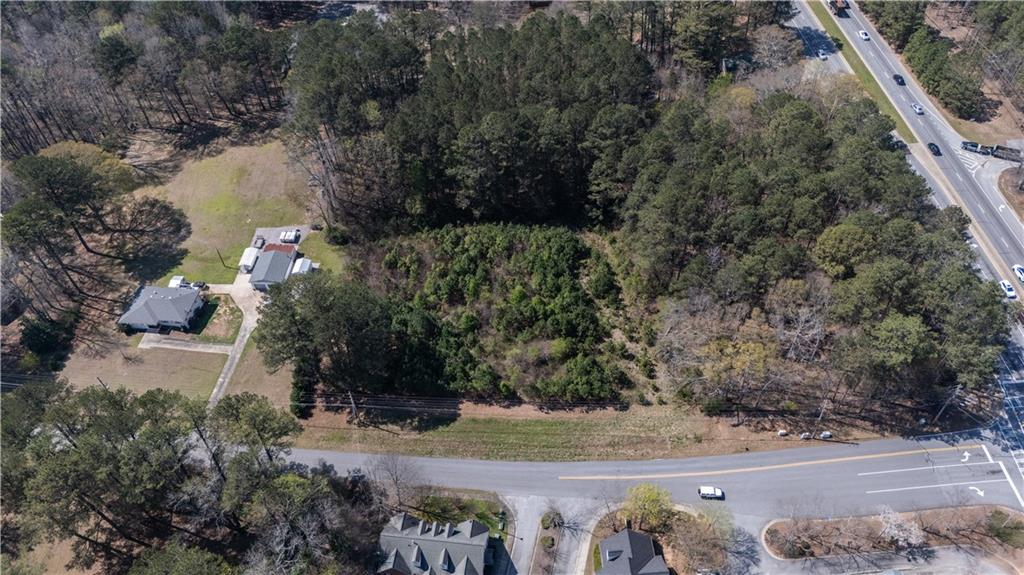 0 East Of Burch Road Fayetteville, GA 30215 - Photo 14 of 16 a view of a lake from a building