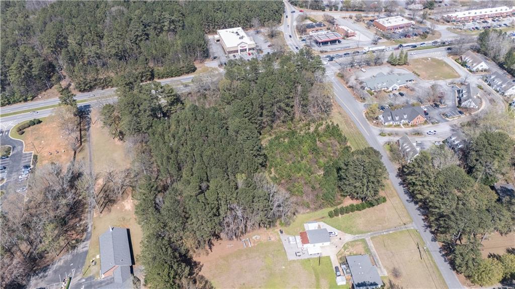 0 East Of Burch Road Fayetteville, GA 30215 - Photo 4 of 16 a view of a house with a yard