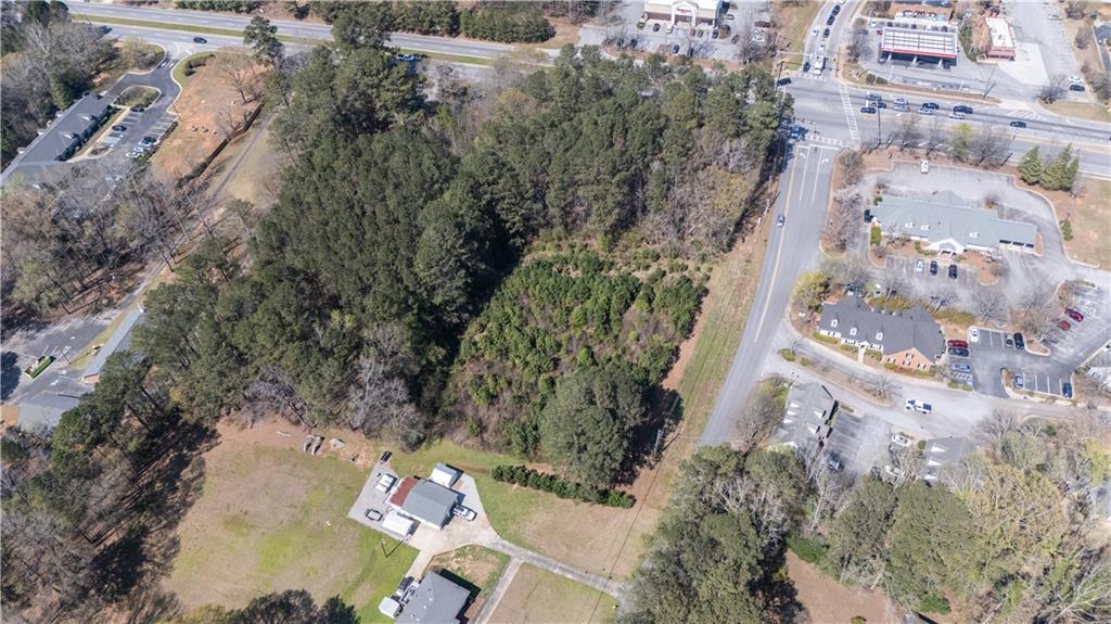 0 East Of Burch Road Fayetteville, GA 30215 - Photo 6 of 16 an aerial view of a house with a yard