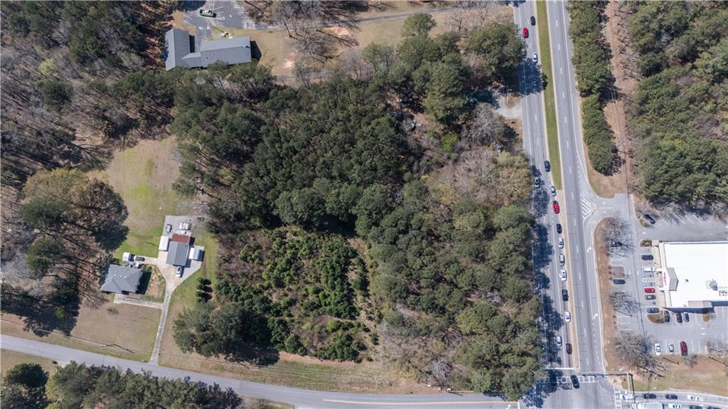 0 East Of Burch Road Fayetteville, GA 30215 - Photo 8 of 16 an aerial view of a house with a yard