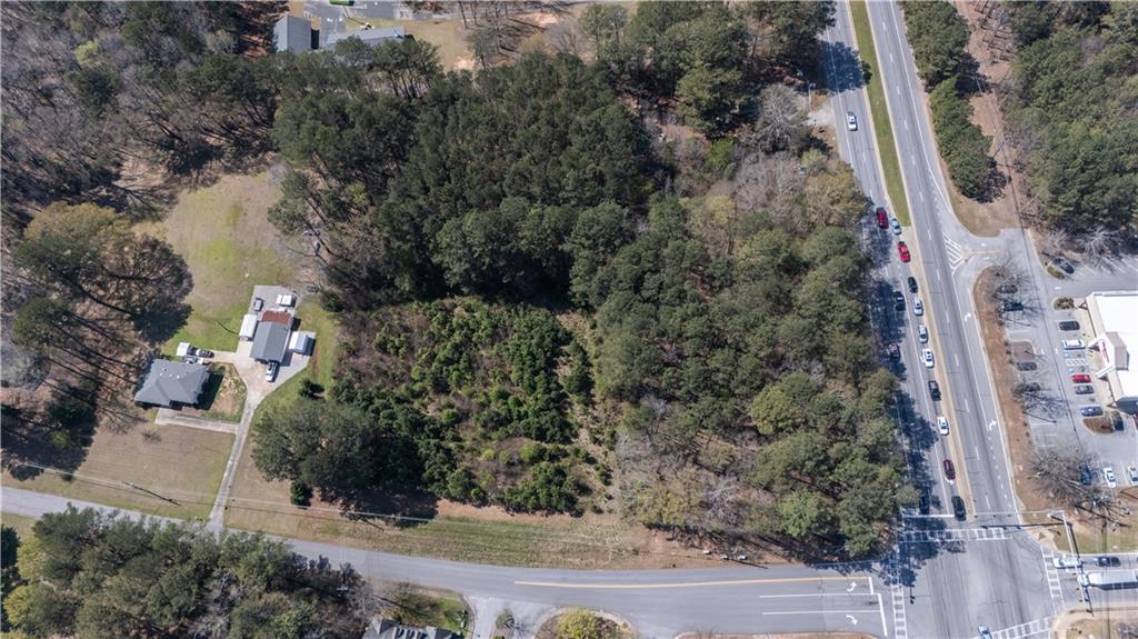 0 East Of Burch Road Fayetteville, GA 30215 - Photo 9 of 16 an aerial view of a residential houses with outdoor space