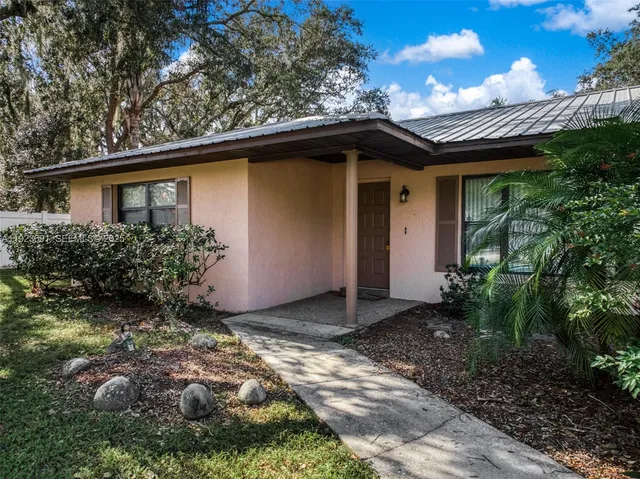 a front view of house with yard