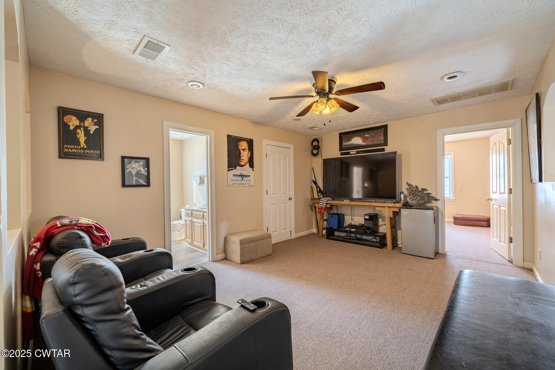 43 Paddock Place Jackson, TN 38305 - Photo 23 of 38 a living room with furniture and a flat screen tv