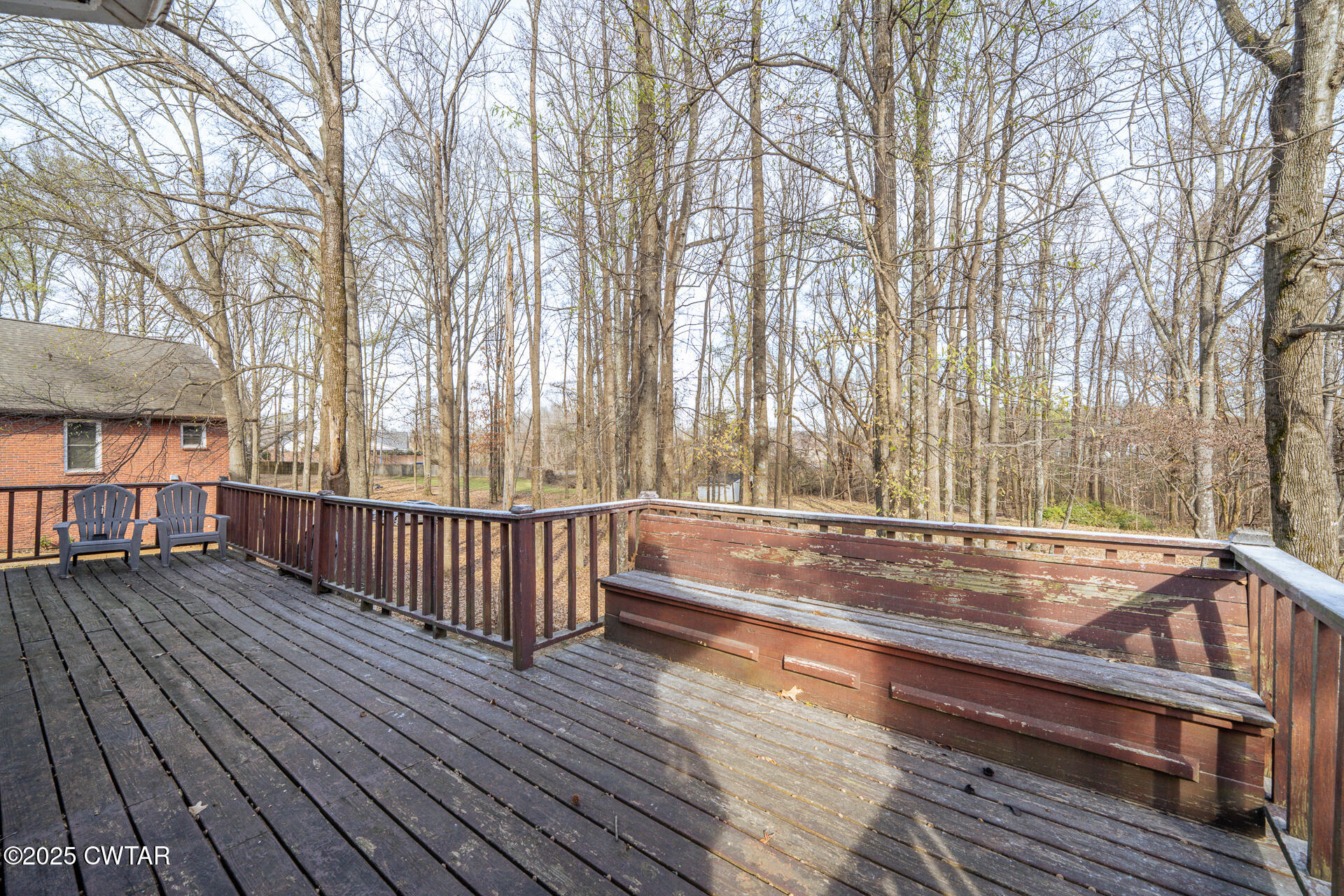 43 Paddock Place Jackson, TN 38305 - Photo 36 of 38 a view of backyard with deck and wooden floor