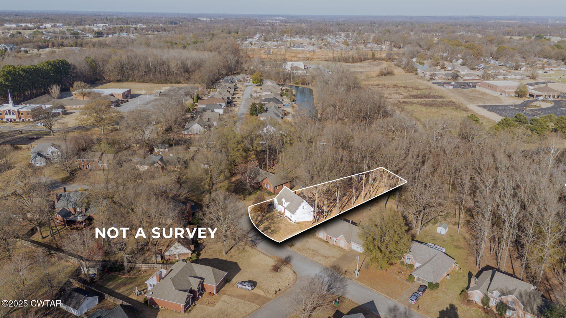 43 Paddock Place Jackson, TN 38305 - Photo 38 of 38 an aerial view of a house with a yard