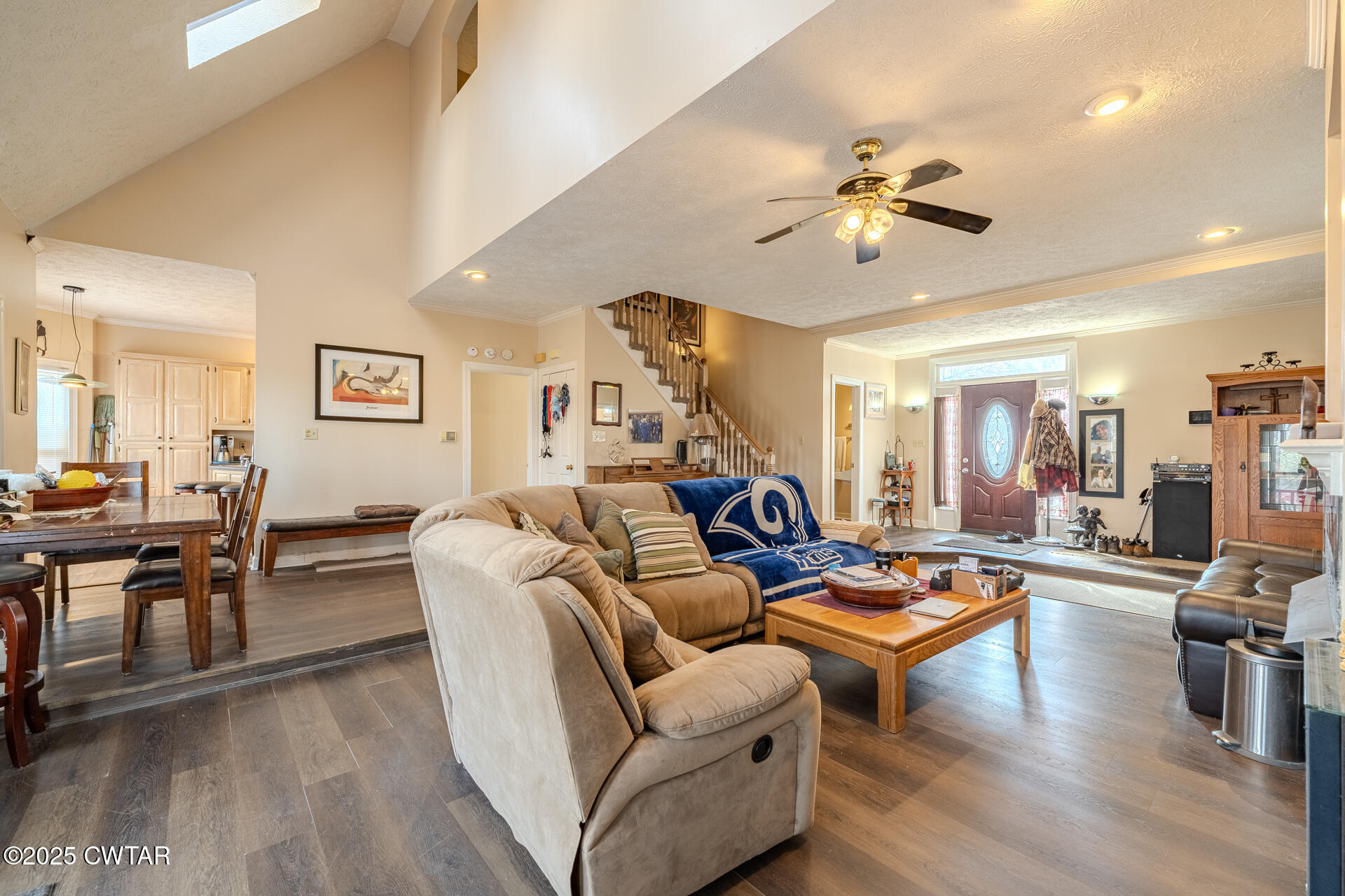 43 Paddock Place Jackson, TN 38305 - Photo 6 of 38 a living room with furniture a wooden floor and chandelier