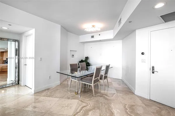 a view of a dining room with furniture
