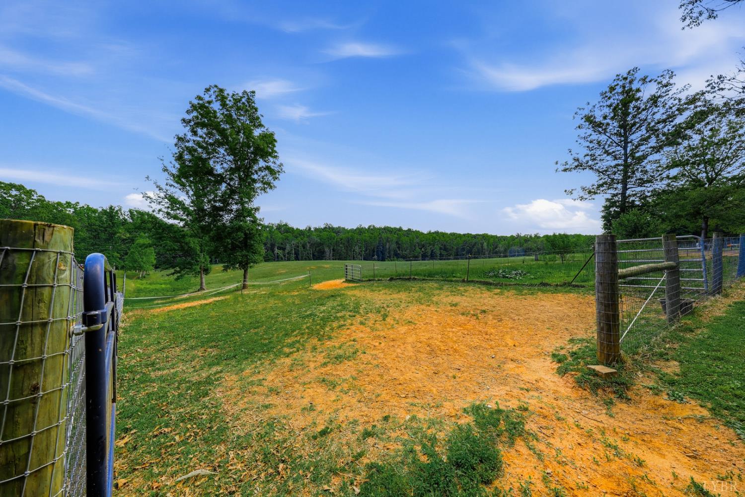 809 Plantation Road Amherst, VA 24521 - Photo 52 of 77 a view of a lake with a yard