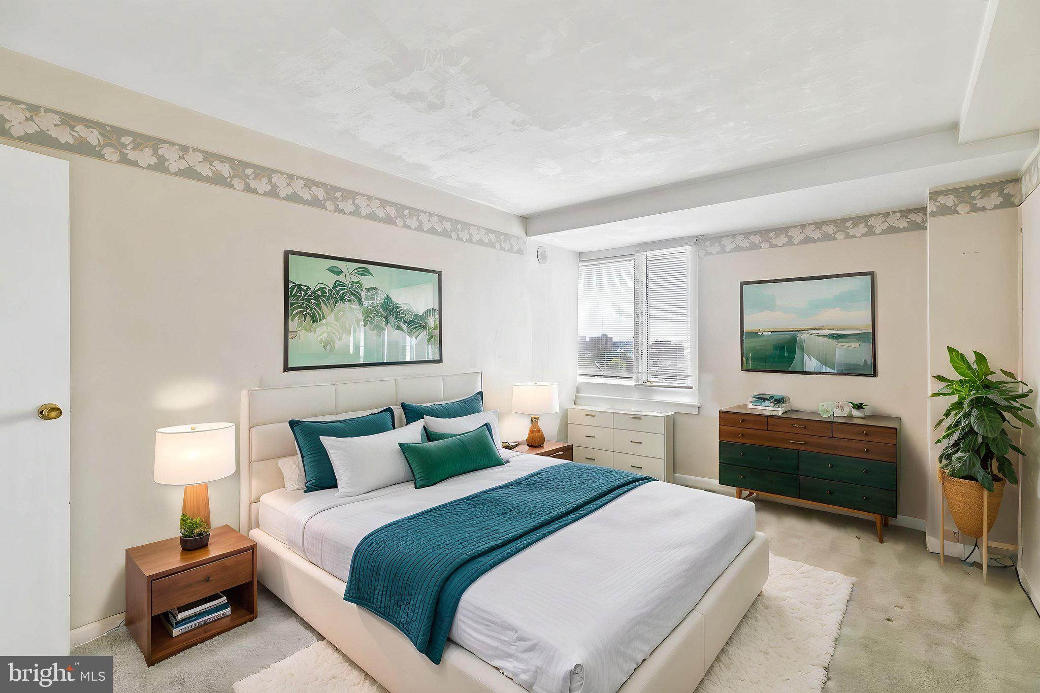 1806 Rittenhouse Square, Unit 905 Philadelphia, PA 19103 - Photo 13 of 24 Serene bedroom with natural light.