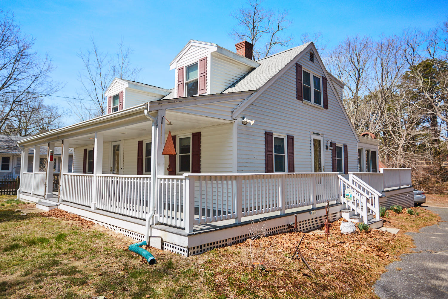 90 Pilgrim Spring Road, Unit 2667 Wellfleet, MA 02667 - Photo 3 of 25 a front view of a house with a yard