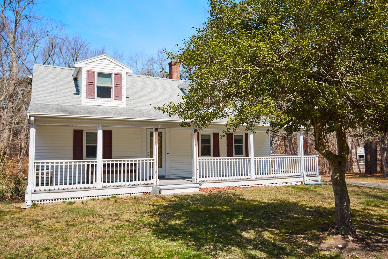 90 Pilgrim Spring Road, Unit 2667 Wellfleet, MA 02667 - Photo 5 of 25 a front view of a house with a yard