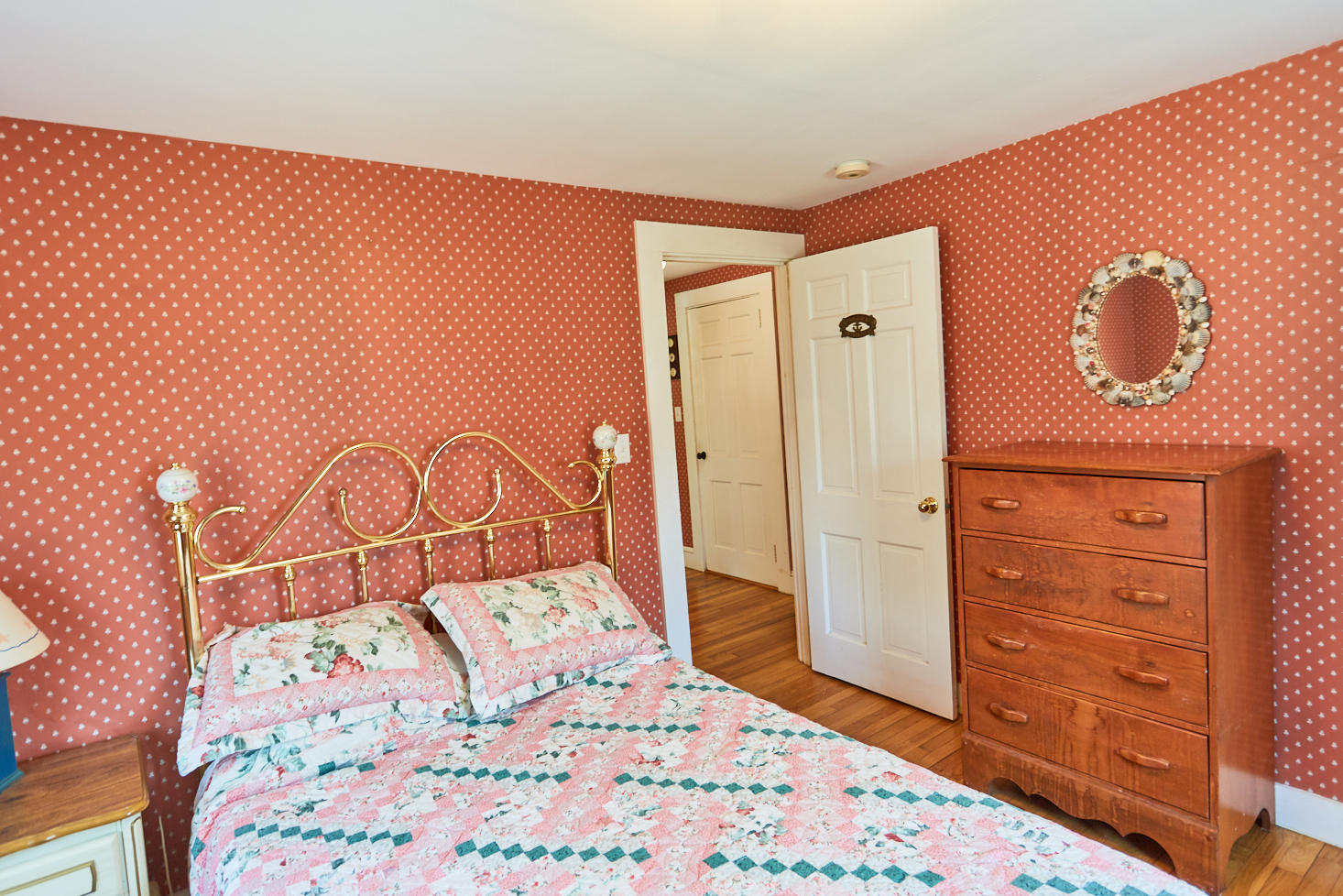 90 Pilgrim Spring Road, Unit 2667 Wellfleet, MA 02667 - Photo 10 of 25 a bedroom with a bed and a dresser