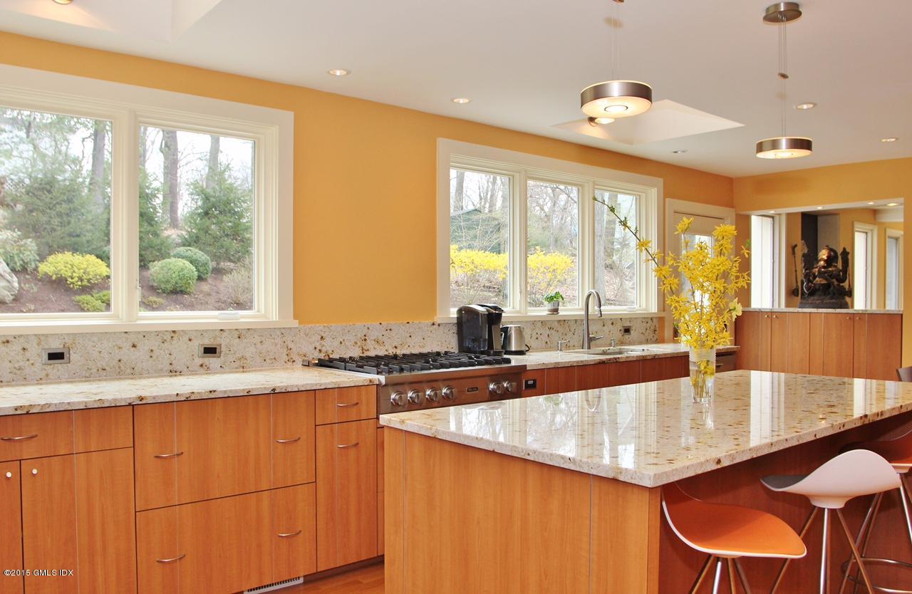 15 Ferncliff Road Cos Cob, CT 06807 - Photo 12 of 16 a kitchen with granite countertop a sink and a counter top space