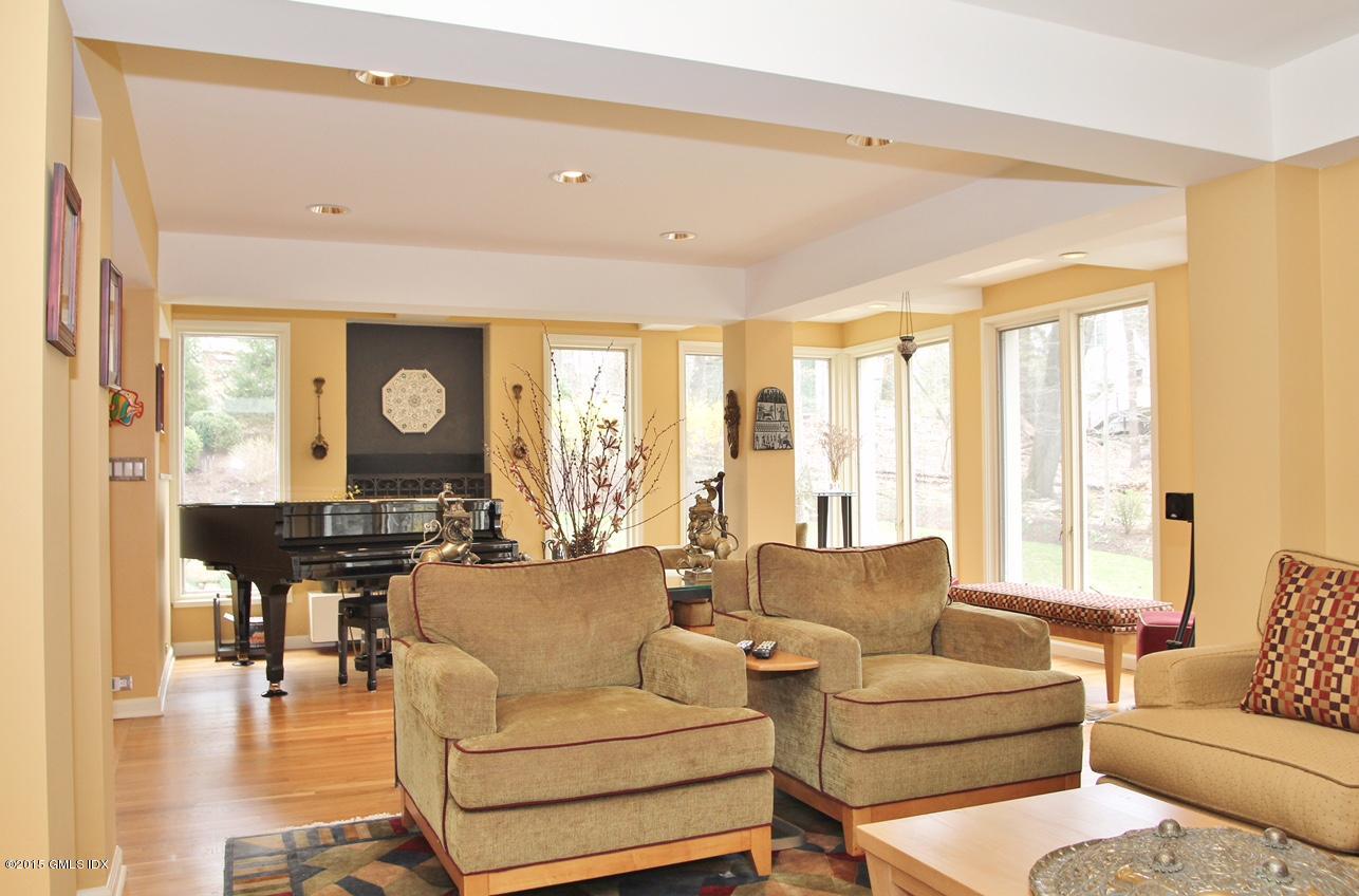 15 Ferncliff Road Cos Cob, CT 06807 - Photo 14 of 16 a living room with furniture and a large window