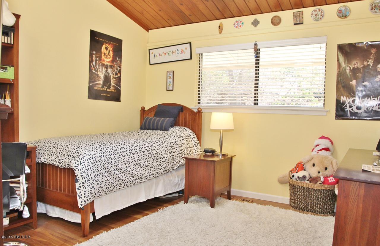 15 Ferncliff Road Cos Cob, CT 06807 - Photo 4 of 16 a bedroom with a bed and a window