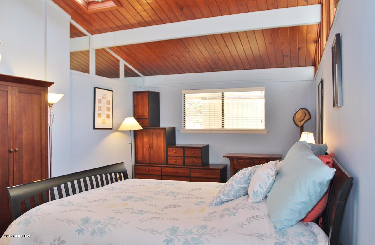 15 Ferncliff Road Cos Cob, CT 06807 - Photo 5 of 16 a bedroom with a bed and window