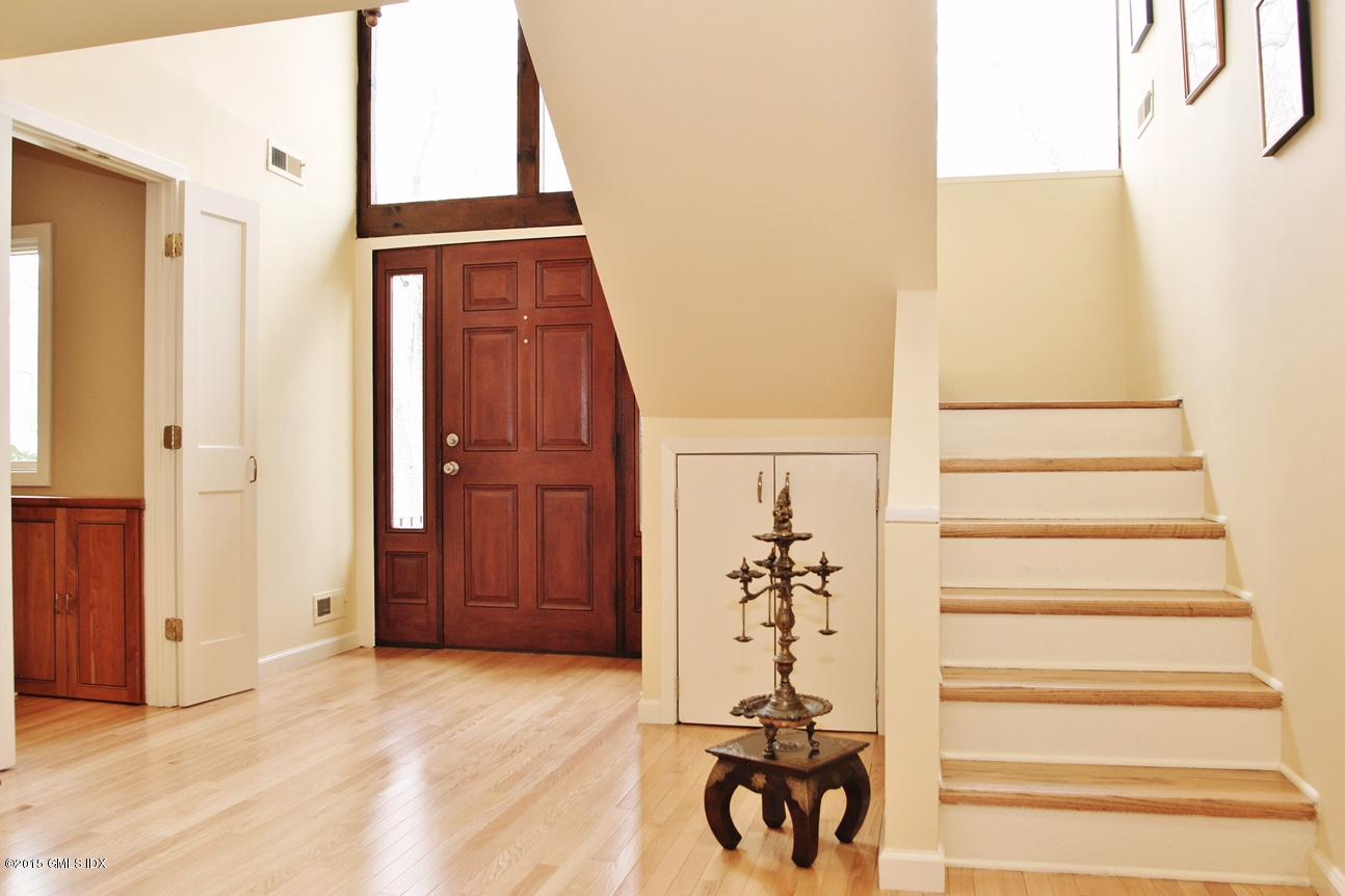 15 Ferncliff Road Cos Cob, CT 06807 - Photo 6 of 16 a view of an entryway with staircase