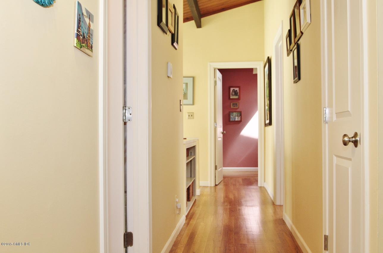 15 Ferncliff Road Cos Cob, CT 06807 - Photo 7 of 16 a view of a bathroom from a hallway