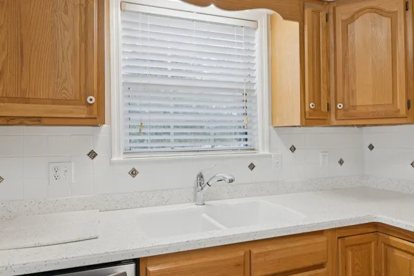 a view of cabinets with wooden floor