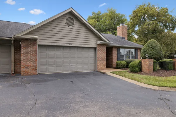 a view of outdoor space and front view of a house