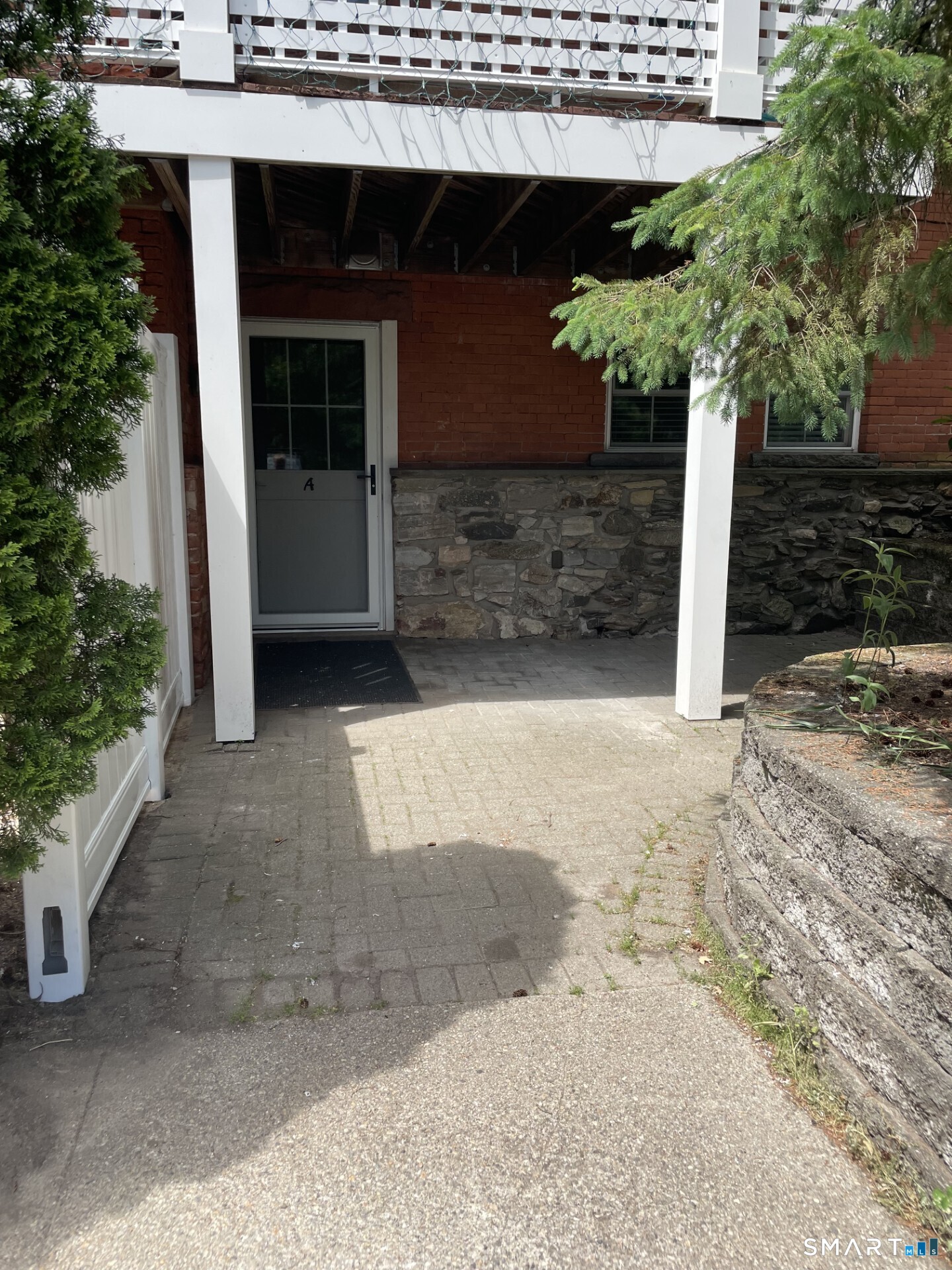 9 Nashville Road, Unit 1A Bethel, CT 06801 - Photo 3 of 18 Private entry garden patio