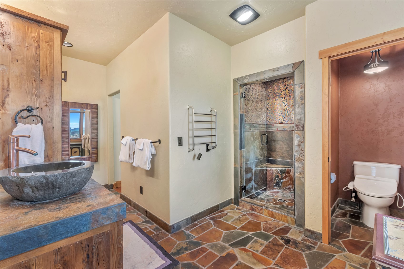 31485 Deerwood Ranch Road Steamboat Springs, CO 80487 - Photo 35 of 49 a view of a living room and bathroom