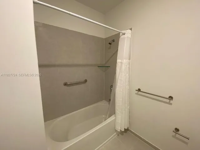 a bathroom with a bathtub