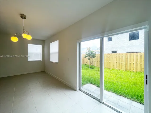 a view of an empty room with window