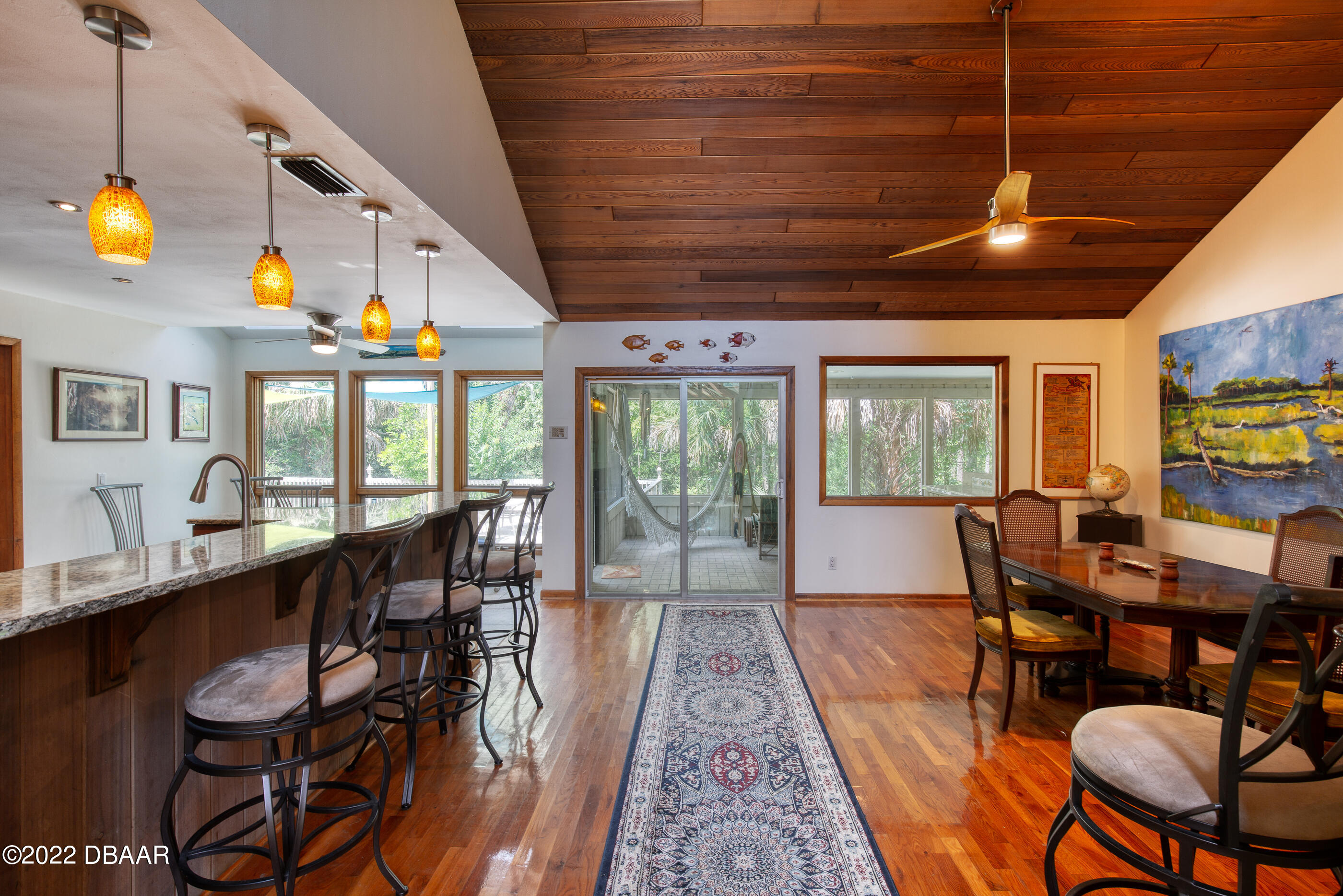 110 River Bluff Drive Ormond Beach, FL 32174 - Photo 18 of 57 a view of a dining room with furniture window and outside view