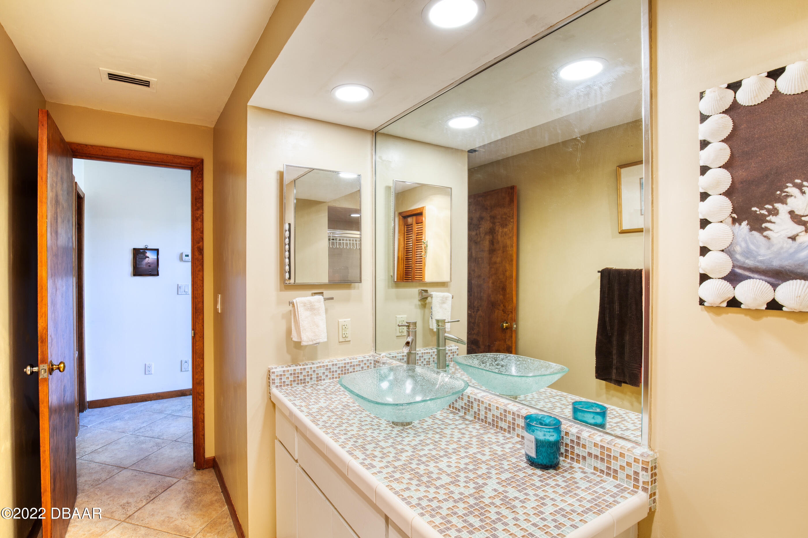 110 River Bluff Drive Ormond Beach, FL 32174 - Photo 29 of 57 a view of a kitchen area with granite countertop wooden floor