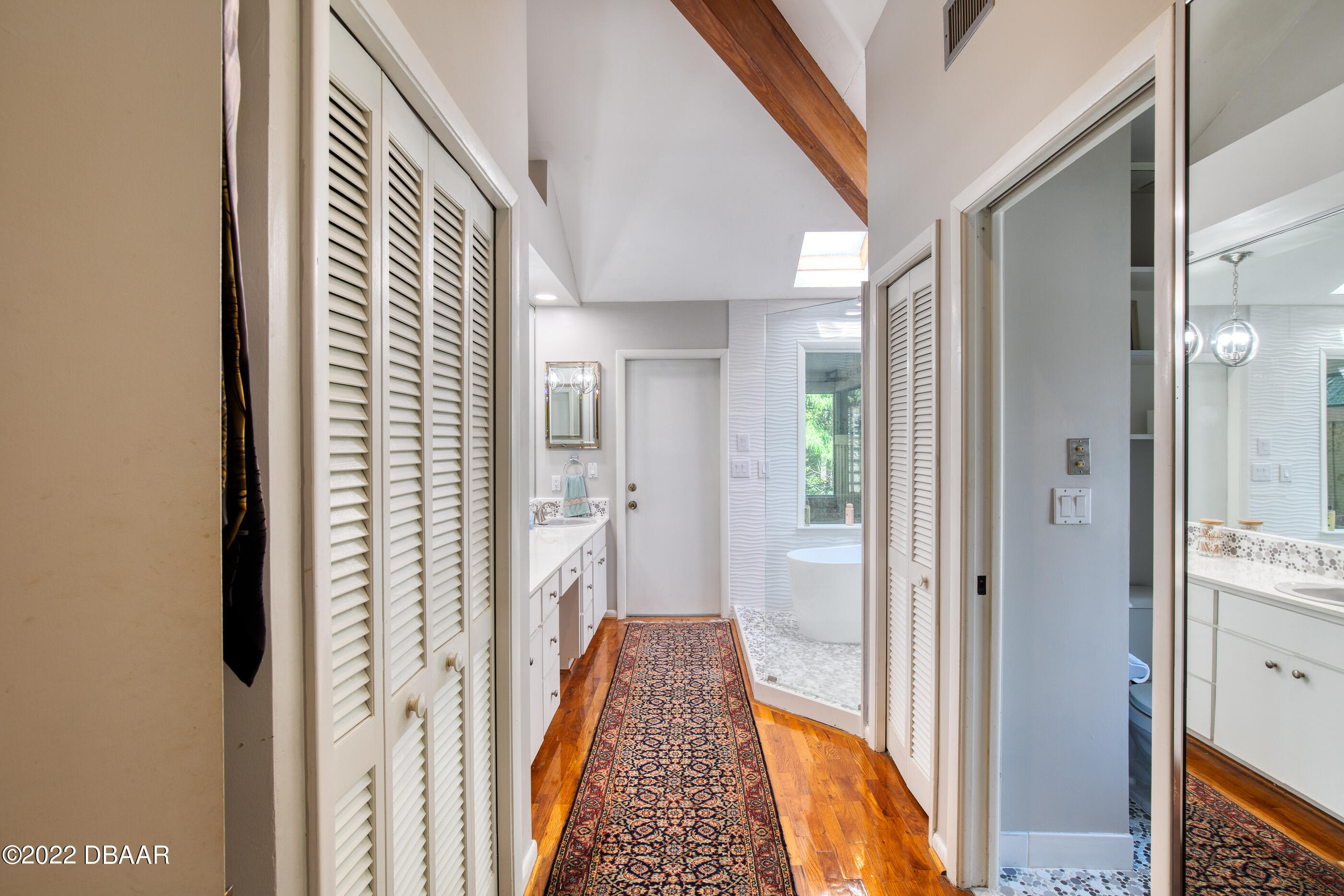110 River Bluff Drive Ormond Beach, FL 32174 - Photo 33 of 57 a view of a hallway with wooden floor and staircase