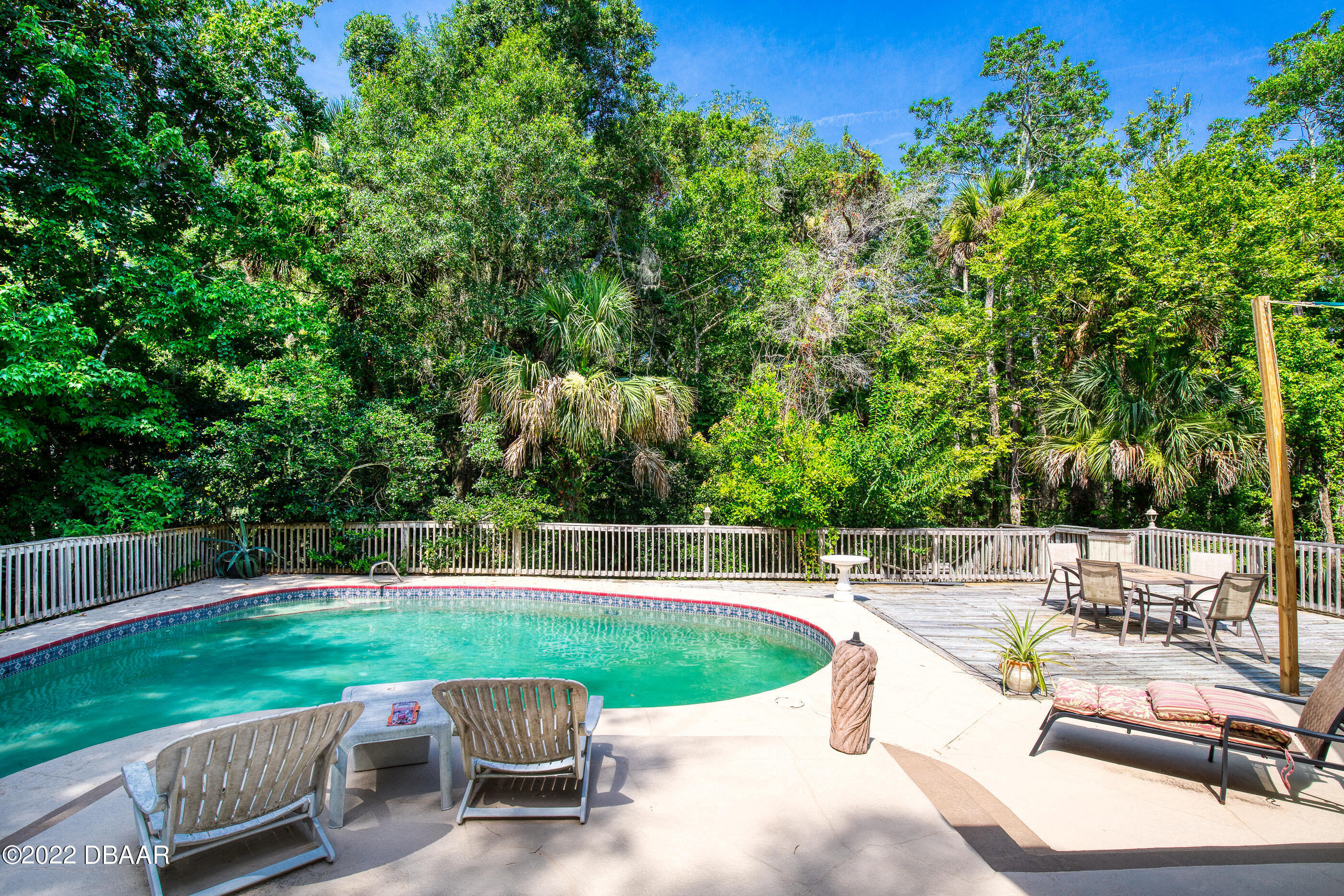 110 River Bluff Drive Ormond Beach, FL 32174 - Photo 49 of 57 a view of a swimming pool with a patio