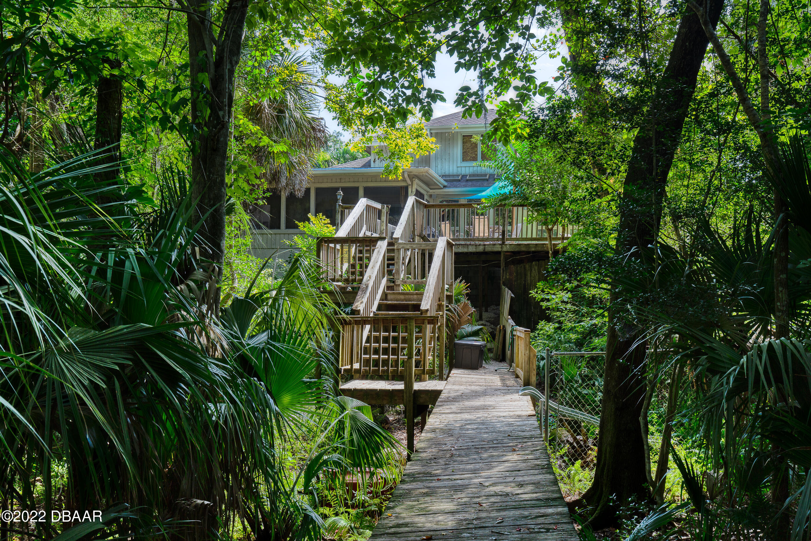 110 River Bluff Drive Ormond Beach, FL 32174 - Photo 54 of 57 a front view of a house with a yard