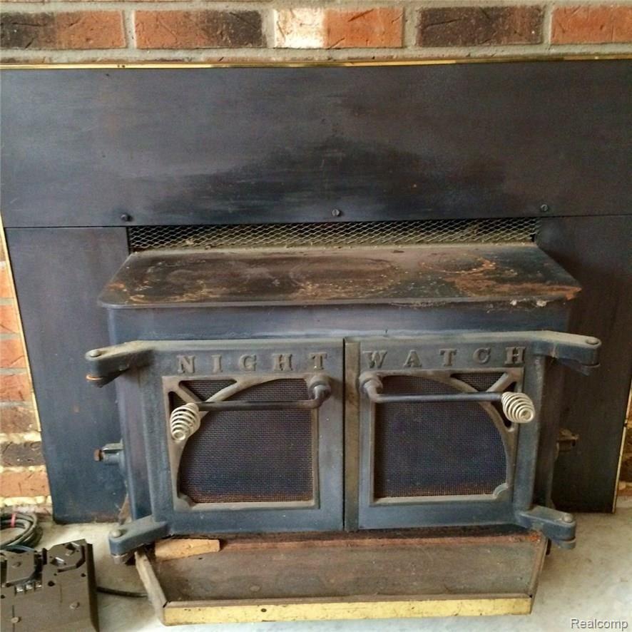 4081 West Schafer Road Pinckney, MI 48169 - Photo 7 of 36 Night Watch wood burner