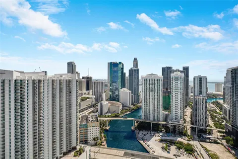 a view of city with tall buildings