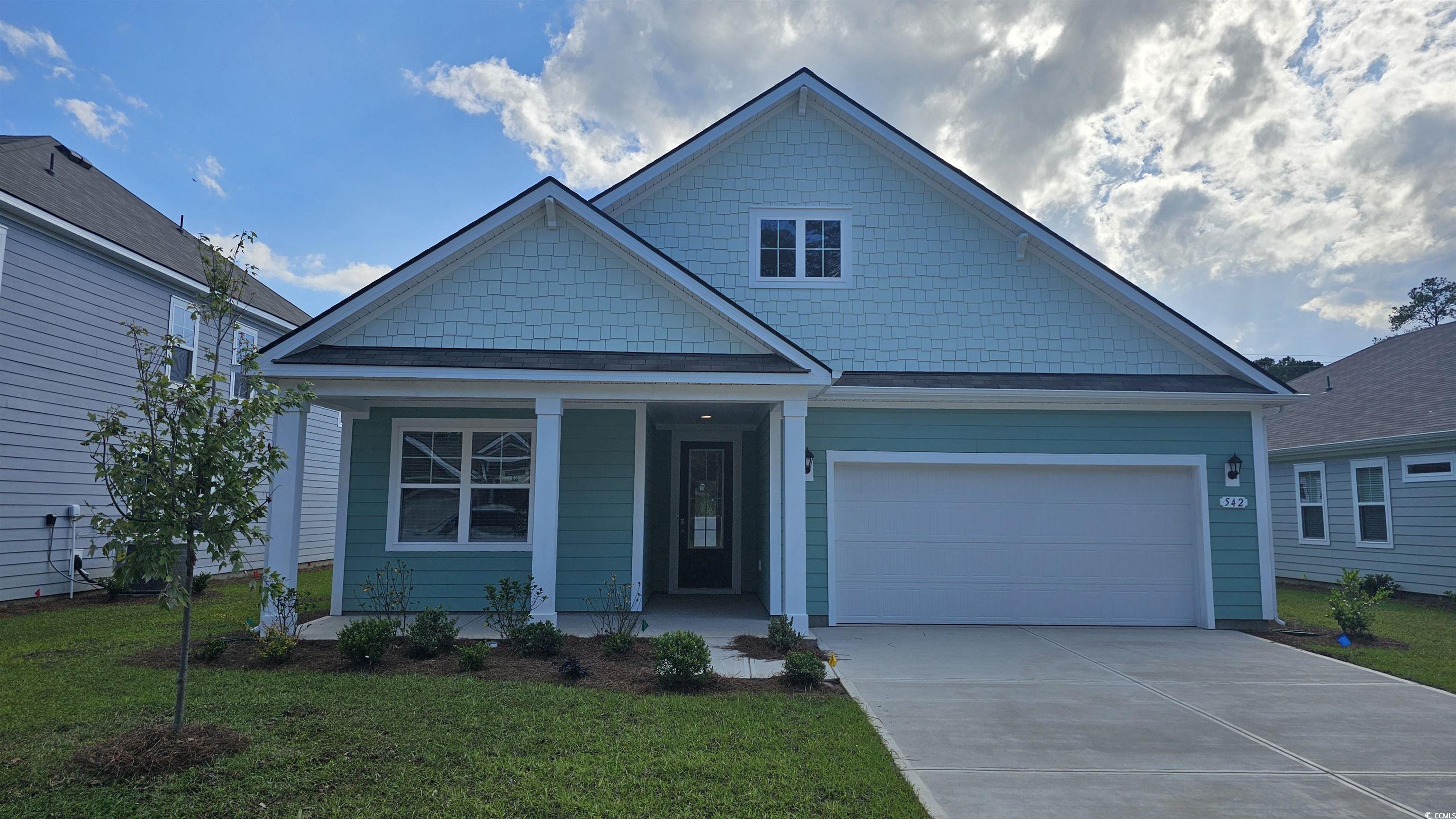 542 Haven View Way Murrells Inlet, SC 29576 - Photo 1 of 31 View of front facade with driveway, a front lawn,