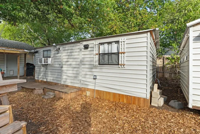 a room with furniture and a flat screen tv